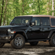 Here’s a Wrangler without the Rubicon’s 33" tires. These are roughly 31-32".